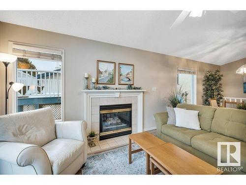 148 Oeming Road, Edmonton, AB - Indoor Photo Showing Living Room With Fireplace