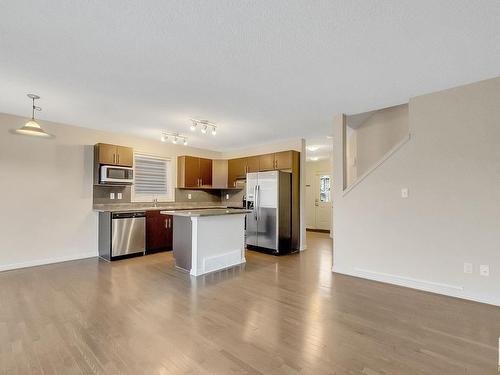 91 Keystone Crescent, Leduc, AB - Indoor Photo Showing Kitchen With Stainless Steel Kitchen