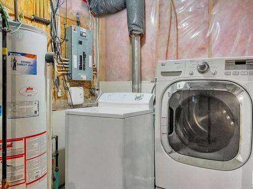 91 Keystone Crescent, Leduc, AB - Indoor Photo Showing Laundry Room