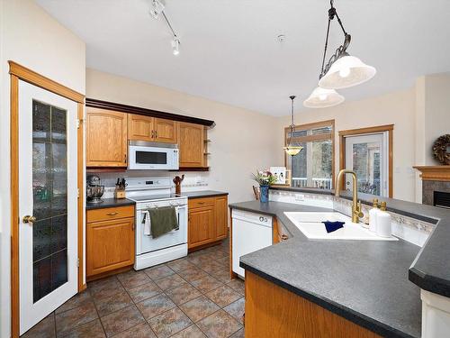 67 53302 Rge Road 261, Rural Parkland County, AB - Indoor Photo Showing Kitchen With Double Sink