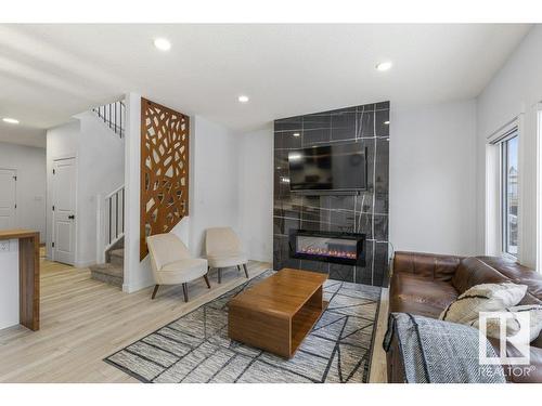 20714 99A Avenue, Edmonton, AB - Indoor Photo Showing Living Room With Fireplace