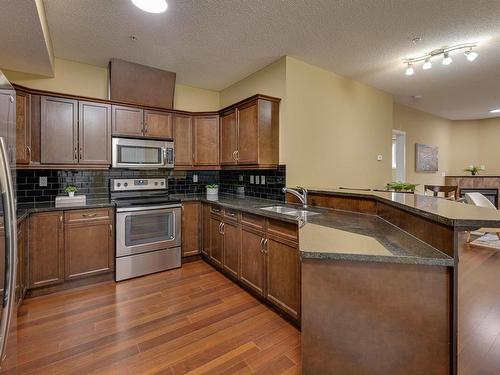 104 7907 109 Street, Edmonton, AB - Indoor Photo Showing Kitchen With Double Sink