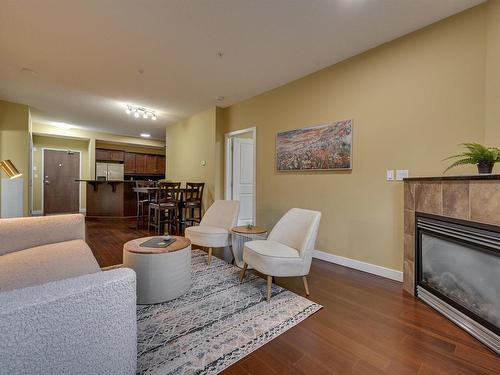 104 7907 109 Street, Edmonton, AB - Indoor Photo Showing Living Room With Fireplace