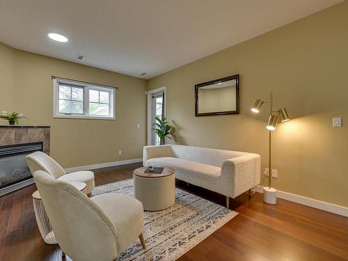 104 7907 109 Street, Edmonton, AB - Indoor Photo Showing Living Room With Fireplace