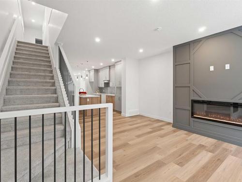 11331 103 Street, Edmonton, AB - Indoor Photo Showing Other Room With Fireplace