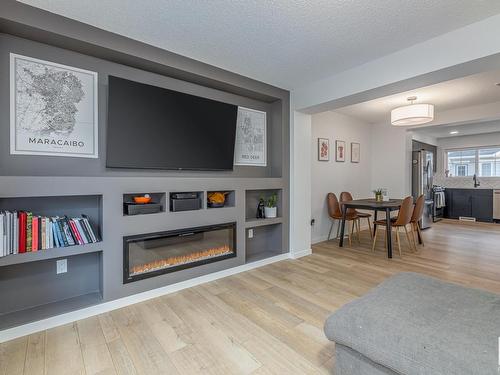 29 1110 Daniels Link, Edmonton, AB - Indoor Photo Showing Living Room With Fireplace