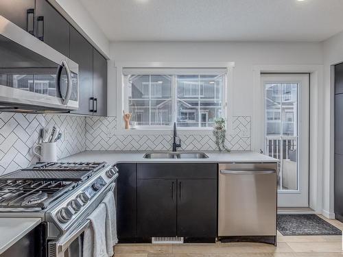 29 1110 Daniels Link, Edmonton, AB - Indoor Photo Showing Kitchen With Double Sink