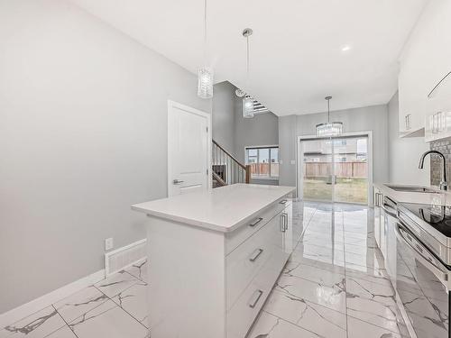 3817 46 Avenue, Beaumont, AB - Indoor Photo Showing Kitchen With Upgraded Kitchen