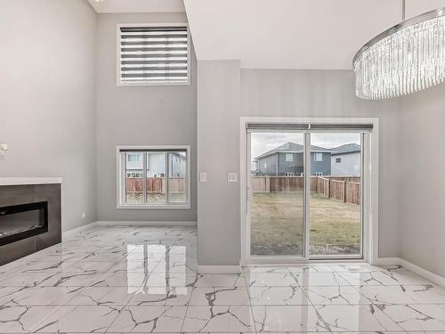 3817 46 Avenue, Beaumont, AB - Indoor Photo Showing Other Room With Fireplace