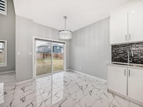 3817 46 Avenue, Beaumont, AB - Indoor Photo Showing Kitchen With Double Sink