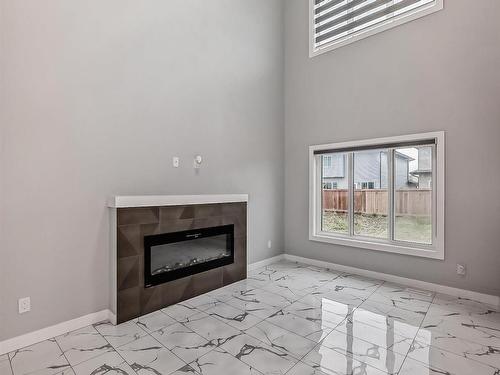 3817 46 Avenue, Beaumont, AB - Indoor With Fireplace