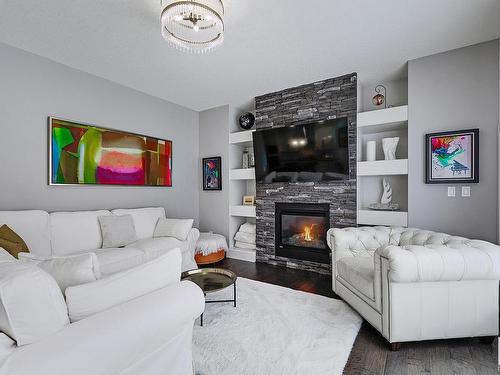 3366 Chickadee Drive, Edmonton, AB - Indoor Photo Showing Living Room With Fireplace