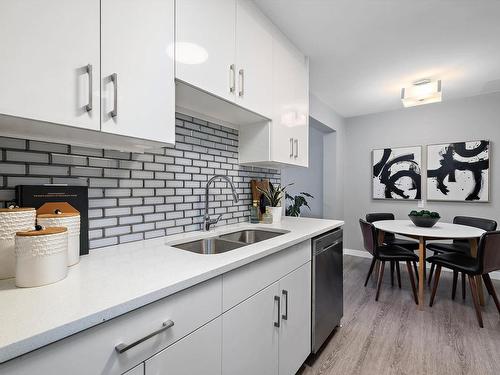 15G Callingwood Court, Edmonton, AB - Indoor Photo Showing Kitchen With Double Sink