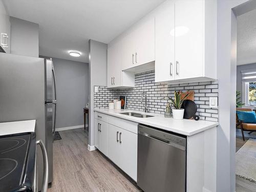 15G Callingwood Court, Edmonton, AB - Indoor Photo Showing Kitchen With Stainless Steel Kitchen With Double Sink