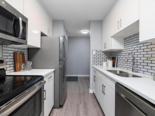 15G Callingwood Court, Edmonton, AB - Indoor Photo Showing Kitchen With Double Sink