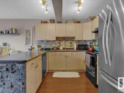 87 Ventura Street, Spruce Grove, AB - Indoor Photo Showing Kitchen With Double Sink