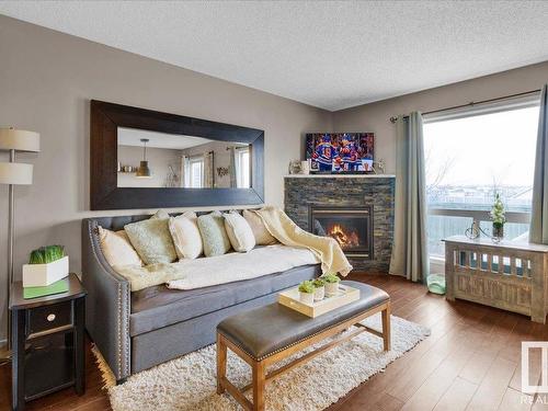 87 Ventura Street, Spruce Grove, AB - Indoor Photo Showing Living Room With Fireplace