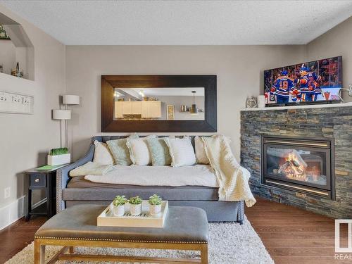 87 Ventura Street, Spruce Grove, AB - Indoor Photo Showing Living Room With Fireplace