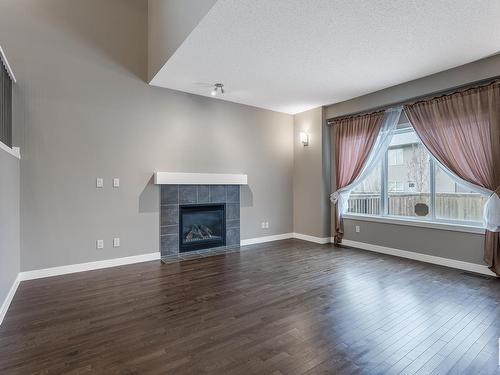 21932 97 Avenue, Edmonton, AB - Indoor Photo Showing Living Room With Fireplace