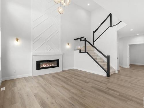 32 Avonlea Way, Spruce Grove, AB - Indoor Photo Showing Living Room With Fireplace