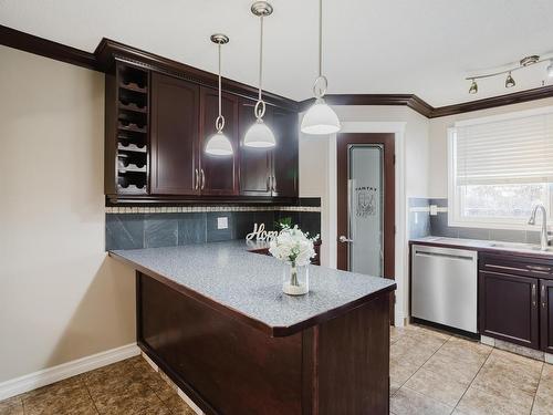 12812 47 Street, Edmonton, AB - Indoor Photo Showing Kitchen With Double Sink