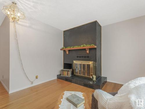 13008 133 Street, Edmonton, AB - Indoor Photo Showing Living Room With Fireplace