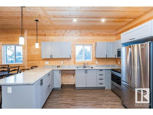 9731 109 Street, Westlock, AB - Indoor Photo Showing Kitchen With Stainless Steel Kitchen With Double Sink