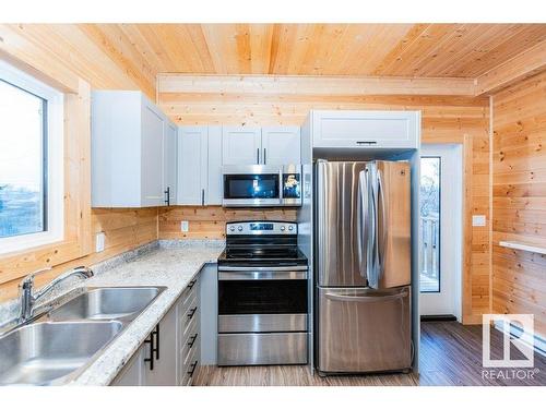 9731 109 Street, Westlock, AB - Indoor Photo Showing Kitchen With Stainless Steel Kitchen With Double Sink