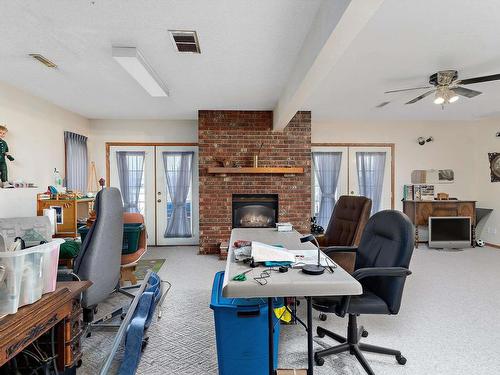 12 J Brown Place, Leduc, AB - Indoor Photo Showing Office With Fireplace