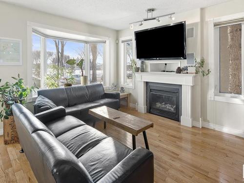 7326 111 Avenue, Edmonton, AB - Indoor Photo Showing Living Room With Fireplace