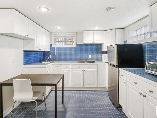 7326 111 Avenue, Edmonton, AB - Indoor Photo Showing Kitchen