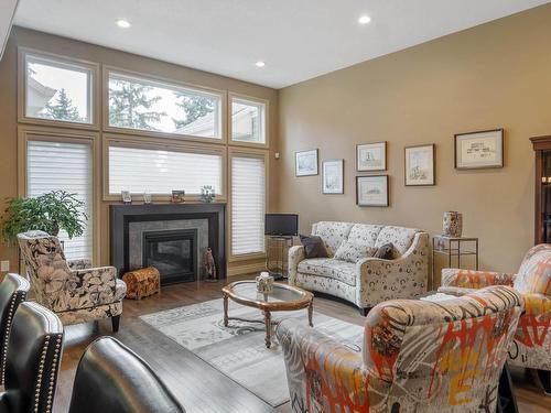 65 Lincoln Green, Spruce Grove, AB - Indoor Photo Showing Living Room With Fireplace