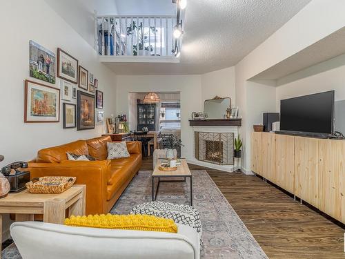 11922 102 Avenue, Edmonton, AB - Indoor Photo Showing Living Room With Fireplace