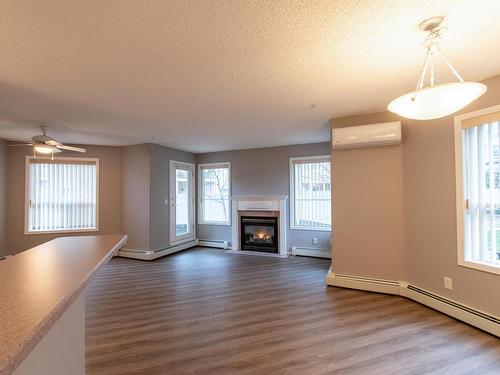 124 9730 174 Street, Edmonton, AB - Indoor Photo Showing Living Room With Fireplace