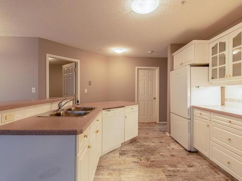 124 9730 174 Street, Edmonton, AB - Indoor Photo Showing Kitchen With Double Sink