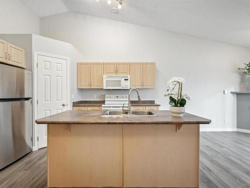 12 4527 55 Avenue, Tofield, AB - Indoor Photo Showing Kitchen With Double Sink