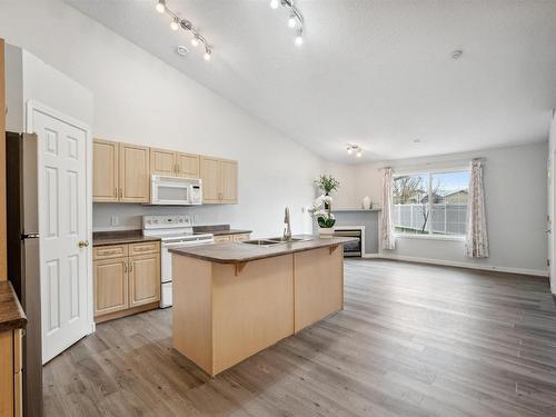 12 4527 55 Avenue, Tofield, AB - Indoor Photo Showing Kitchen With Double Sink