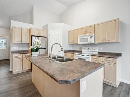 12 4527 55 Avenue, Tofield, AB - Indoor Photo Showing Kitchen With Double Sink