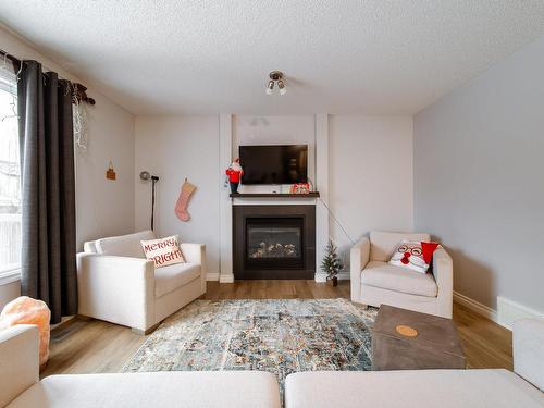 20740 96 Avenue, Edmonton, AB - Indoor Photo Showing Living Room With Fireplace