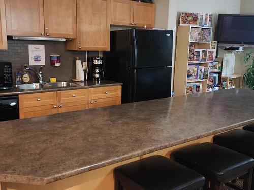 239 160 Magrath Road, Edmonton, AB - Indoor Photo Showing Kitchen With Double Sink