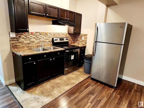 11328 86 Street, Edmonton, AB - Indoor Photo Showing Kitchen With Double Sink