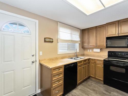 6730 36A Avenue, Edmonton, AB - Indoor Photo Showing Kitchen With Double Sink