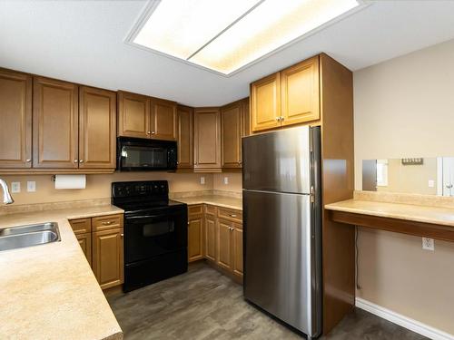 6730 36A Avenue, Edmonton, AB - Indoor Photo Showing Kitchen With Double Sink