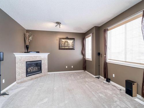 837 Barnes Link Link, Edmonton, AB - Indoor With Fireplace