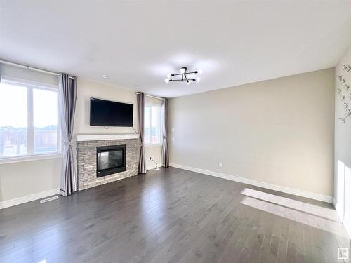 16607 18 Avenue, Edmonton, AB - Indoor Photo Showing Living Room With Fireplace