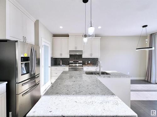 16607 18 Avenue, Edmonton, AB - Indoor Photo Showing Kitchen With Double Sink