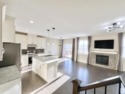 16607 18 Avenue, Edmonton, AB - Indoor Photo Showing Kitchen With Fireplace