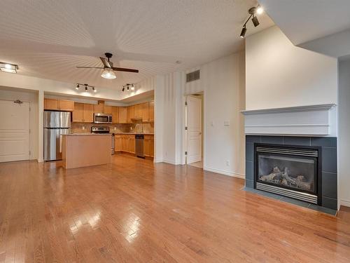 201 10319 111 Street, Edmonton, AB - Indoor With Fireplace