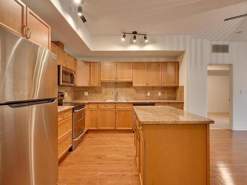 201 10319 111 Street, Edmonton, AB - Indoor Photo Showing Kitchen With Double Sink