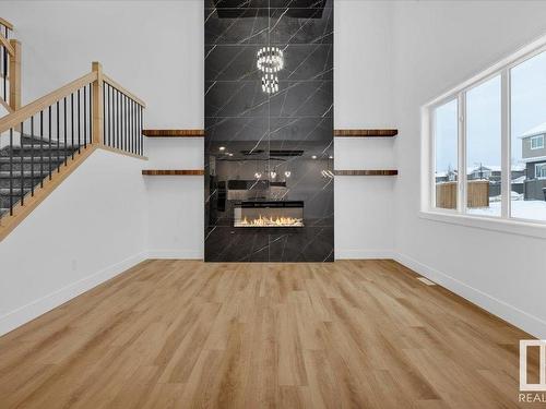 1109 Gyrfalcon Crescent, Edmonton, AB - Indoor With Fireplace